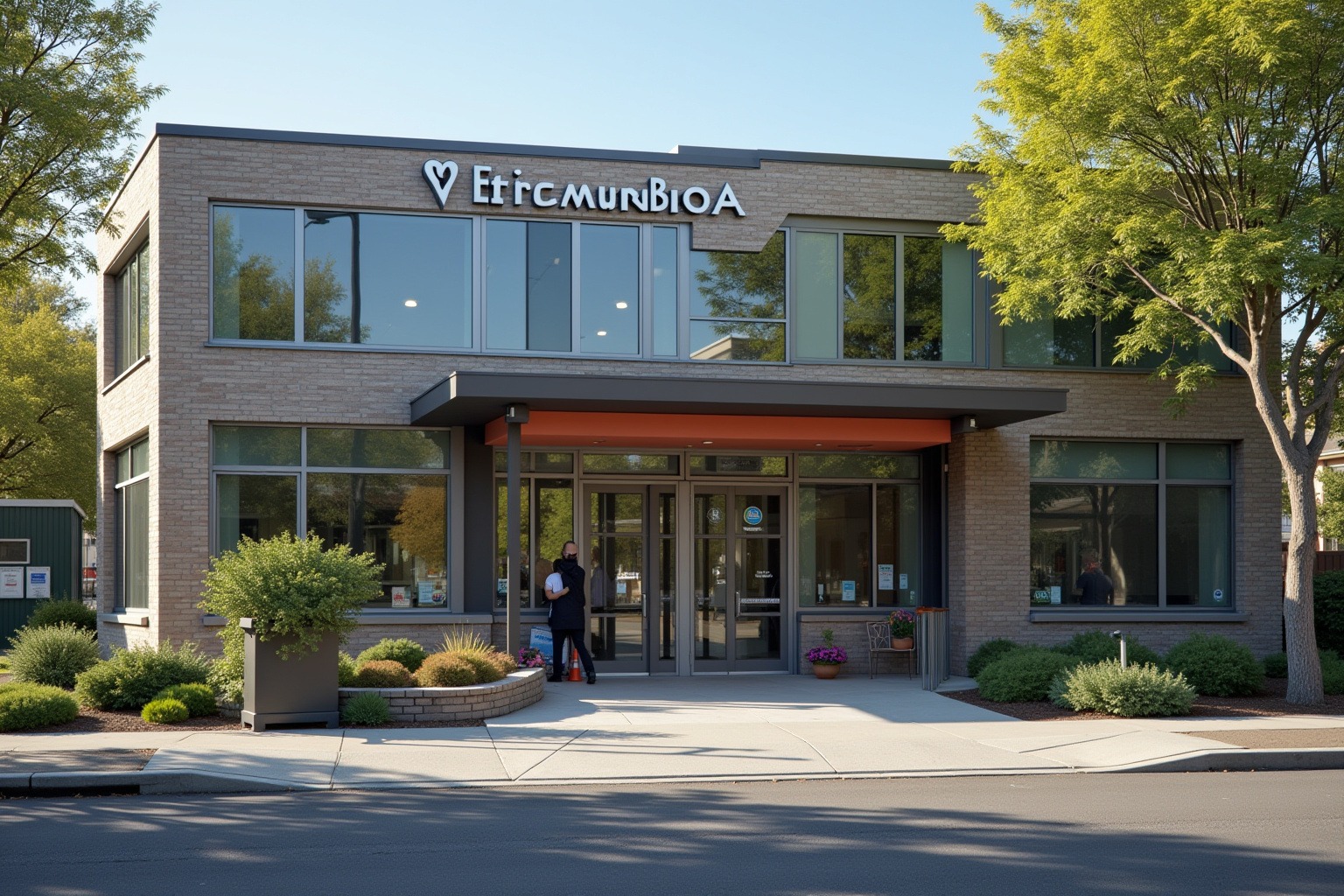 Modern veterinary emergency hospital building exterior with emergency entrance in a Portland neighborhood setting
